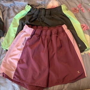 Xersion bundle of 2 lined Shorts Set - Lime and Plum in size M